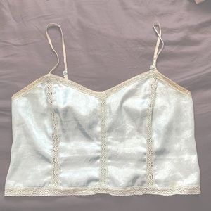 Silk summer crop top that has the look of a corset type of style.
